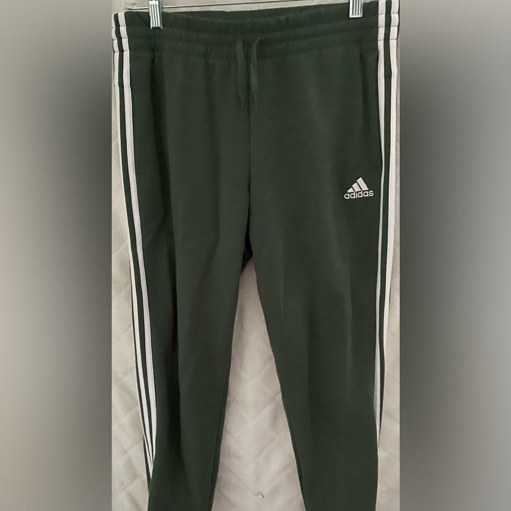Green Adidas sweatpants